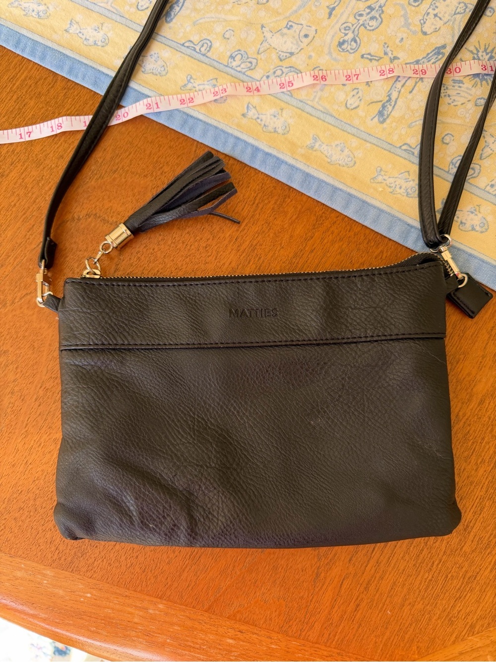 Black Leather Crossbody with Tassel Accent